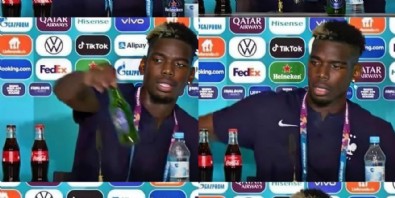 Fransa Milli Takımı'nın Müslüman yıldızı Paul Pogba basın toplantısında önündeki bira şişesini kaldırdı