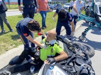 NECMETTİN ERBAKAN - Motosikletli Trafik Polisi Kazada Yaralandi