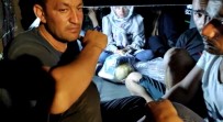 Kaçak Göçmenler Otobüsün Bagajindan Çikti
