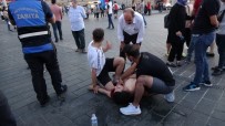(Özel) Taksim Meydani'nda Yere Yigilan Kalp Hastasi Gence Vatandaslar Müdahale Etti