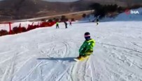 Çin'de 3 Yasindaki Kiz Çocugundan Snowboard Gösterisi