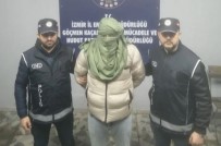 Yüzü Kapali Olan Göçmen Kaçakçisini Iki Kasinin Arasindaki Yara Izi Ele Verdi