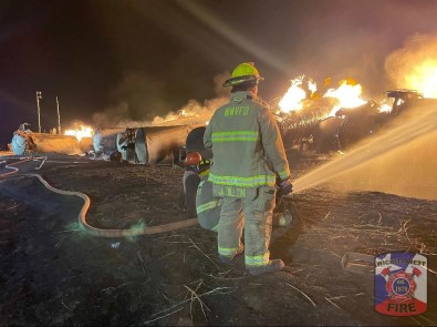 ABD'de Kimyasal Madde Yüklü Tren Raydan Çikarak Alev Aldi