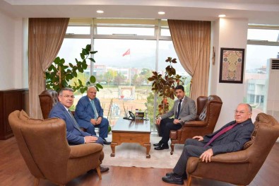 ADÜ Rektörü Aldemir, Eski Bakan Koç'u Agirladi