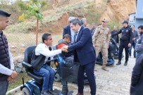 Hizan'da Akülü Tekerlekli Sandalye Dagitimi