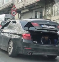 BMW - BMW'ye biniyor! Çocuğu arabanın bagajında taşıyor