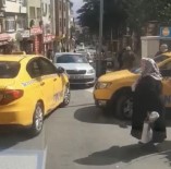 Istanbul'da Yasli Kadin Taksiye Binebilmek Için Yalvardi