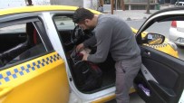 Ticari Takside Unutulan Para Dolu Çantayi Sahibine Teslim Etti