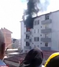 Yangında mahsur kalan kadın balkondan atladı, alt komşusu havada yakaladı!