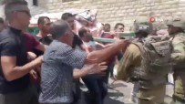 Israil Güçleri, Filistinli Kadinin Cenaze Konvoyuna Saldirdi