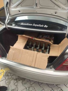 Caminda 'Düzelicez Insallah Be' Yazan Araçla Kaçak Içki Tasirken Yakalandi