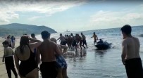 Paramedik Çift, Plajda Bogulma Tehlikesi Geçiren Çocugu Hayata Döndürdü