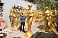 Depoda Muhafaza Edilen Altin Portakal Heykellerini Altin Sarisina Boyama Islemleri Tamamlandi