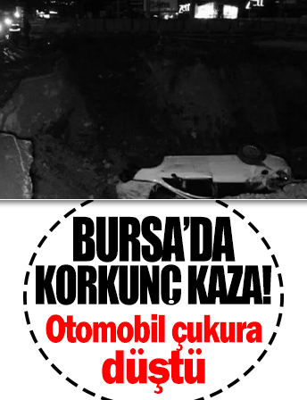 Bursa'da otomobil metro inşaatı nedeniyle kazılan çukura düştü