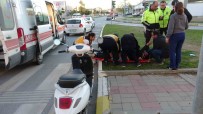 Otomobile Çarpan Motosiklet Sürücüsü Yaralandi