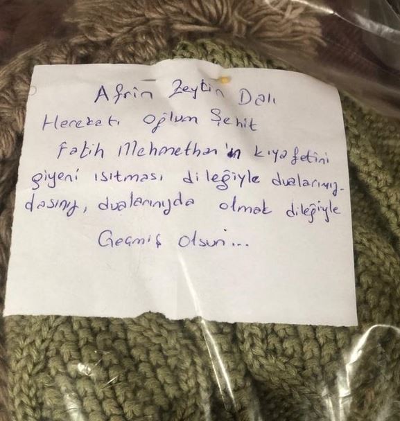 Afrin şehidi oğlunun kıyafetlerini depremzedelere gönderdi