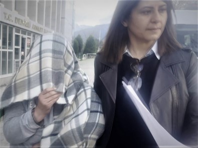 Bebegini Bogup Esi Yakmaya Çalisan Kadin Tutuklandi