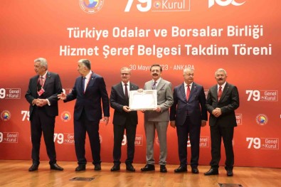 Kütükcü, TOBB Hizmet Seref Belgesi Aldi