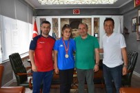 Sampiyon Güresçiden Baskan Sülük'e Ziyaret