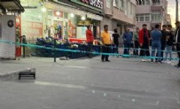 Kayseri'de, dükkanının önünde çıkan kavgayı ayırmaya çalışan esnaf, kurşunların hedefi oldu