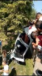 Yoldan Çikan Otomobilin Sarampole Uçmamasi Için Vatandaslar Tuttu