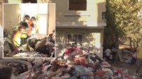 Evden 18 kamyon çöp ve atık çıktı: Kötü kokular yayılınca fark ettiler
