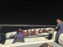 Sahil Güvenlik Uçaginin Tespit Ettigi 18 Düzensiz Göçmen Ayvalik Açiklarinda Yakalandi