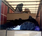 Bursa'da Tir Dorsesinde 9 Kaçak Göçmen Yakalandi