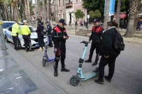 Antalya'da Es Zamanli Elektrikli Scooter Denetimi Açiklamasi 210 Sürücüye Ceza, 155 Scooter Trafikten Men