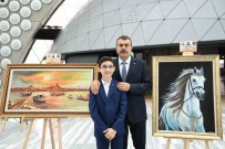 Bakan Tekin Sehit Polis Memuru Hüseyin Gül'ün Oglu Talha'nin Sergisini Ziyaret Etti