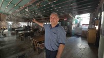 Kavurucu Sicaklarda Müsterilerini Su Buhari Ile Serinletiyor Haberi