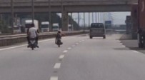 Otobanda Motosikletin Üzerine Yatarak Canini Hiçe Sayan Çilgin Sürücüye 10 Bin TL Ceza Haberi