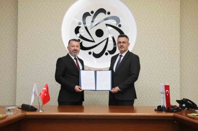 BTÜ Ve KBÜ'den Akademik Is Birligi