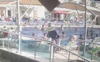 Otelin Havuz Basinda Kafasina Düsen Baca Kapagiyla Ölümden Döndü Haberi