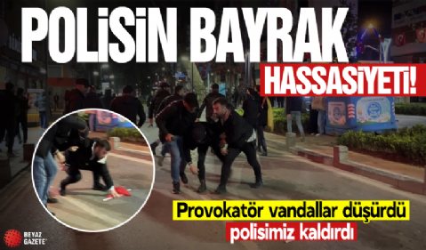 Kocaeli'de polis memuru eylemcilerin düşürdüğü bayrağı kaldırdı
