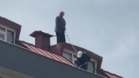 İstanbul'da çatıya çıkan işçinin akılalmaz 'güvenlik önlemi'